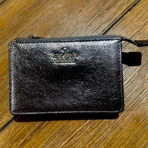 Kate Spade small card holder. Brand new condition, barely used.